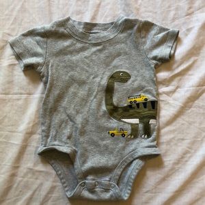 5/$5 Carter’s onsie with dinosaur